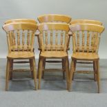 A set of six beech spindle back dining chairs