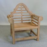 A teak Marlborough style garden armchair,