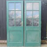 A pair of glazed painted doors,