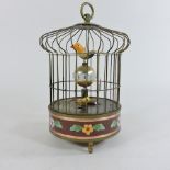 A reproduction automaton bird cage clock,