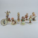 A collection of various Hummell figures, tallest 165cm,