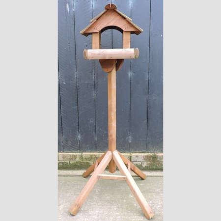 A wooden bird table,