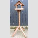 A wooden bird table,