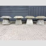 A set of four staddle stones,