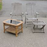 A pair of teak steamer chairs, together with a teak stool and a bamboo occasional table,
