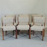 A set of six 1960's teak and cream upholstered dining chairs