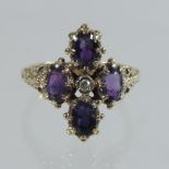 A 9 carat gold amethyst and diamond ring,