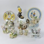 A collection of continental porcelain to include a Naples model of a parrot, 26cm tall,