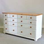 A large pine and painted chest containing two rows of five drawers,