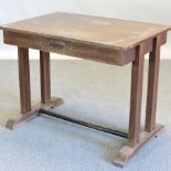 An early 20th century teak side table,