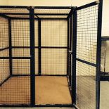 A large steel framed wire animal cage,