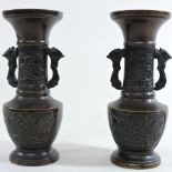 A pair of Chinese bronze twin handled vases,