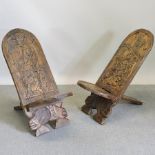 A pair of African carved hardwood side chairs,