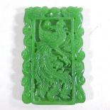 A jade pendant, relief decorated with dragons,