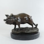 A bronze model of a pig,