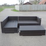 A rattan two seater sofa, 140cm,
