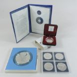 A collection of coins to include Franklin Mint, First Twenty Balboa coin of the Republic of Panama,