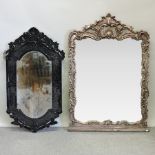 An ornate silver painted wall mirror, 132 x 95cm overall,