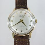 A 1970's Astral gentleman's wristwatch, on a leather strap,
