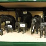 A collection of early 20th century Indian carved hardwood models of elephants