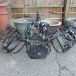A pair of garden planters, together with a pair of wrought iron wall pockets, 53cm,