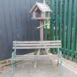 A hardwood garden bench, with iron ends, 123cm,