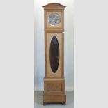 An early 20th century light oak Smith's longcase clock,