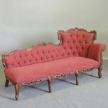 A red upholstered button back show frame chaise longue,