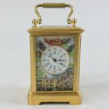 A miniature brass cased porcelain Imari style carriage clock,