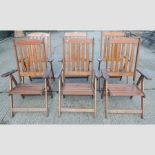 A set of six wooden folding reclining garden chairs