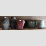 A collection of seven terracotta pots, together with other pots,