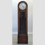 An Art Deco oak cased long case clock, signed Enfield,