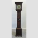 An oak cased longcase clock, having a ten inch brass dial, signed Wm.