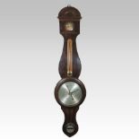 An unusual 19th century mahogany cased wheel barometer, with an arched case,