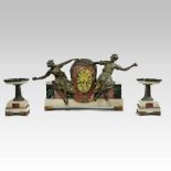 A French Art Deco alabaster, marble and bronzed figural clock garniture,