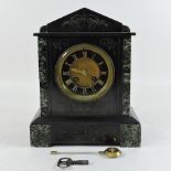 A Victorian black slate mantle clock,