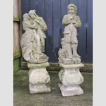 A near pair of reconstituted stone garden statues, each on a plinth base,