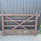 A wooden five bar gate,