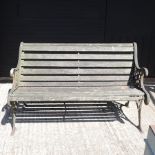 A slatted wooden garden bench,