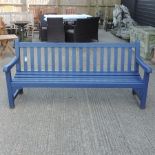 A blue painted, slatted wooden garden bench,