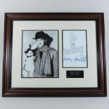 A photograph of James Stewart, mounted by Sport and Star Autographs,