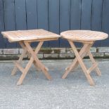 A pair of teak folding garden side tables,