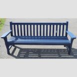 A blue painted slatted wooden garden bench,