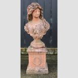 A terracotta bust of a lady, on a pedestal base,