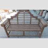 A wooden Marlborough style garden bench,