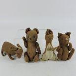 A collection of four early 20th century toy animals,