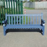 A blue painted slatted wooden garden bench,