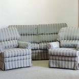 A Christie Tyler turquoise upholstered three piece suite,