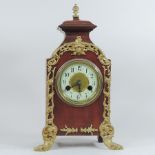 An early 20th century French gilt metal mounted mantel clock,