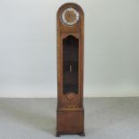 A 1930's oak cased grandmother clock,
